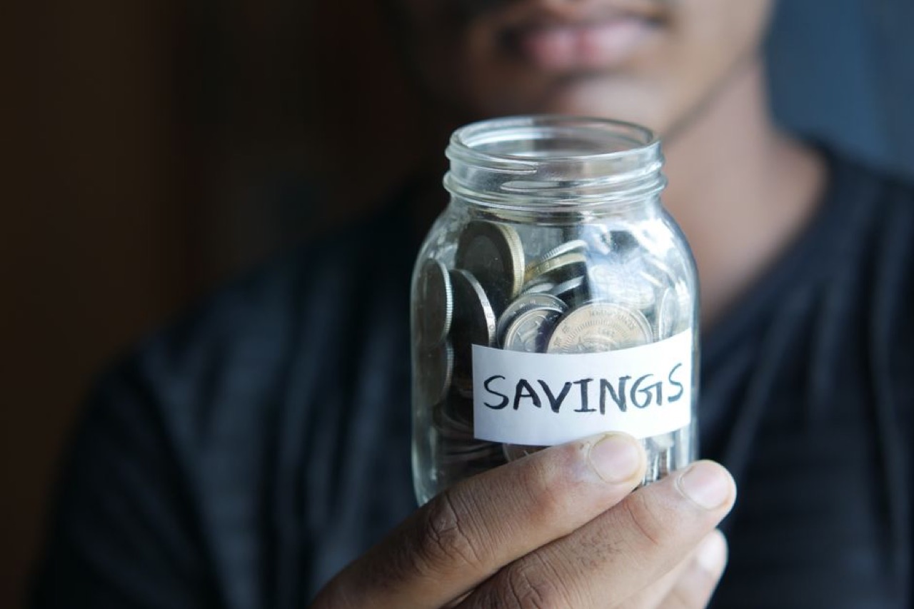 Absa Funeral Cover Saving coins jar
