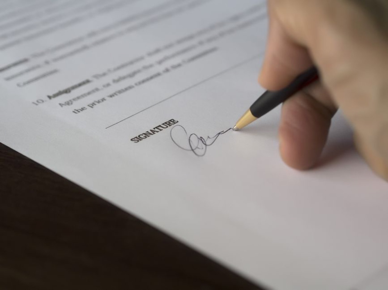 Signing document desk pen