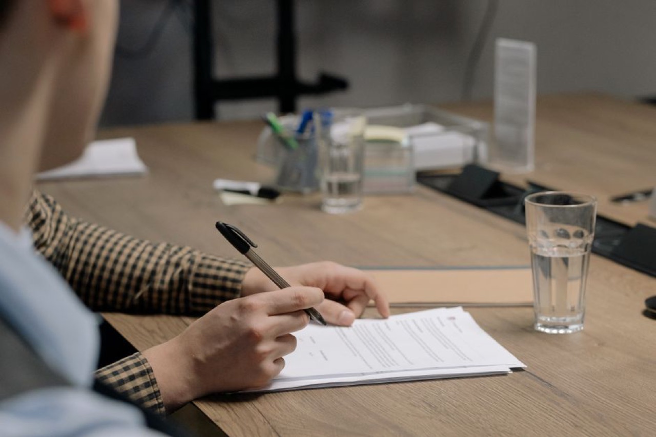 Clientele Funeral Cover Signing document desk pen
