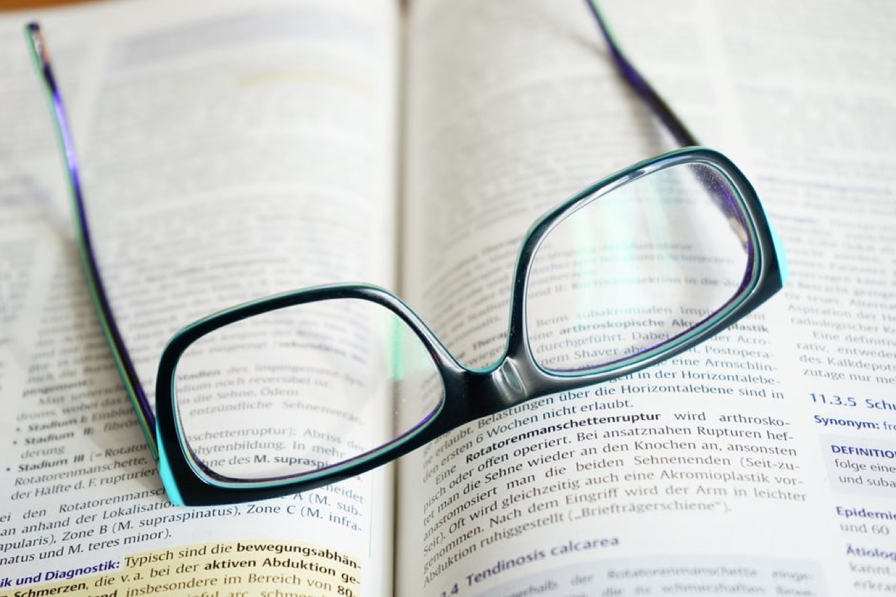 Bible verses for funerals Book and reading glasses