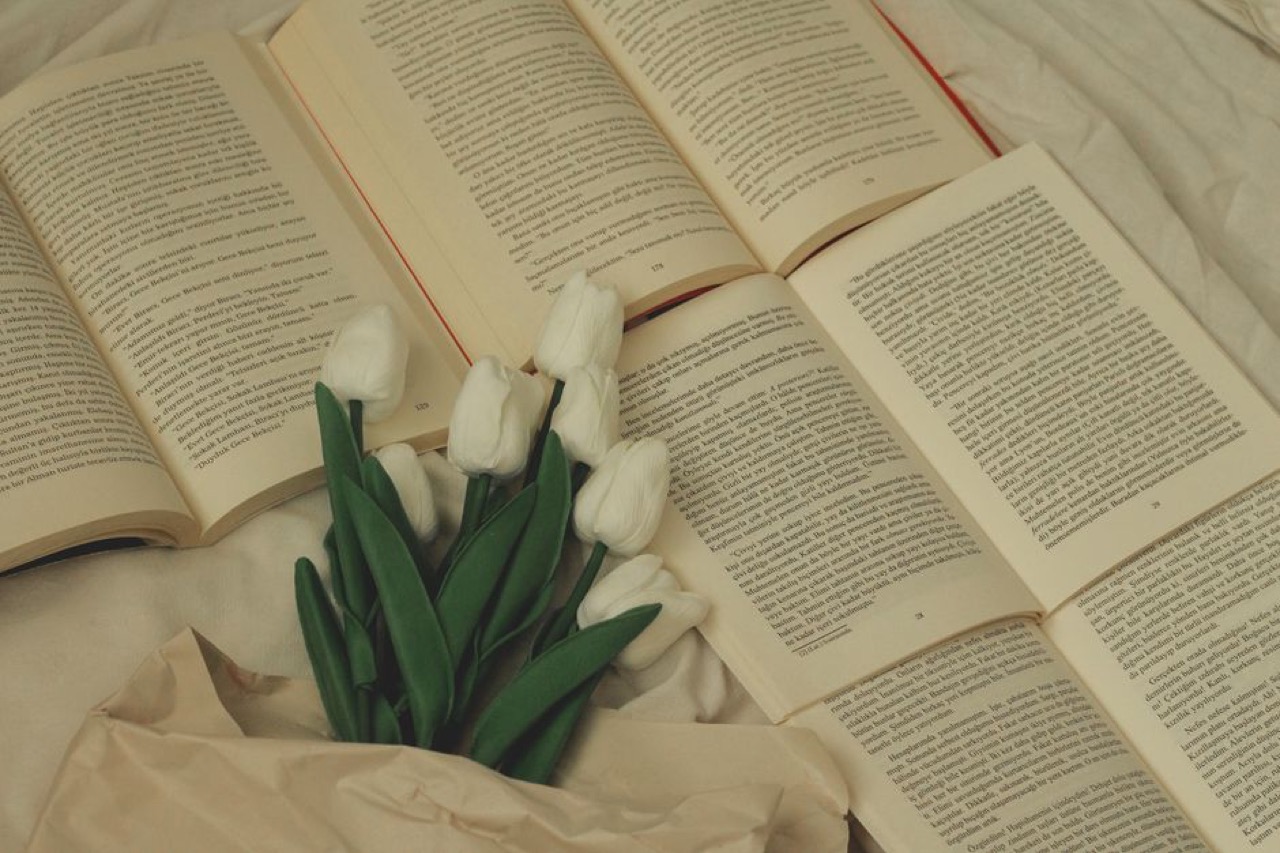 Christian funeral songs and hymns Open book white flowers