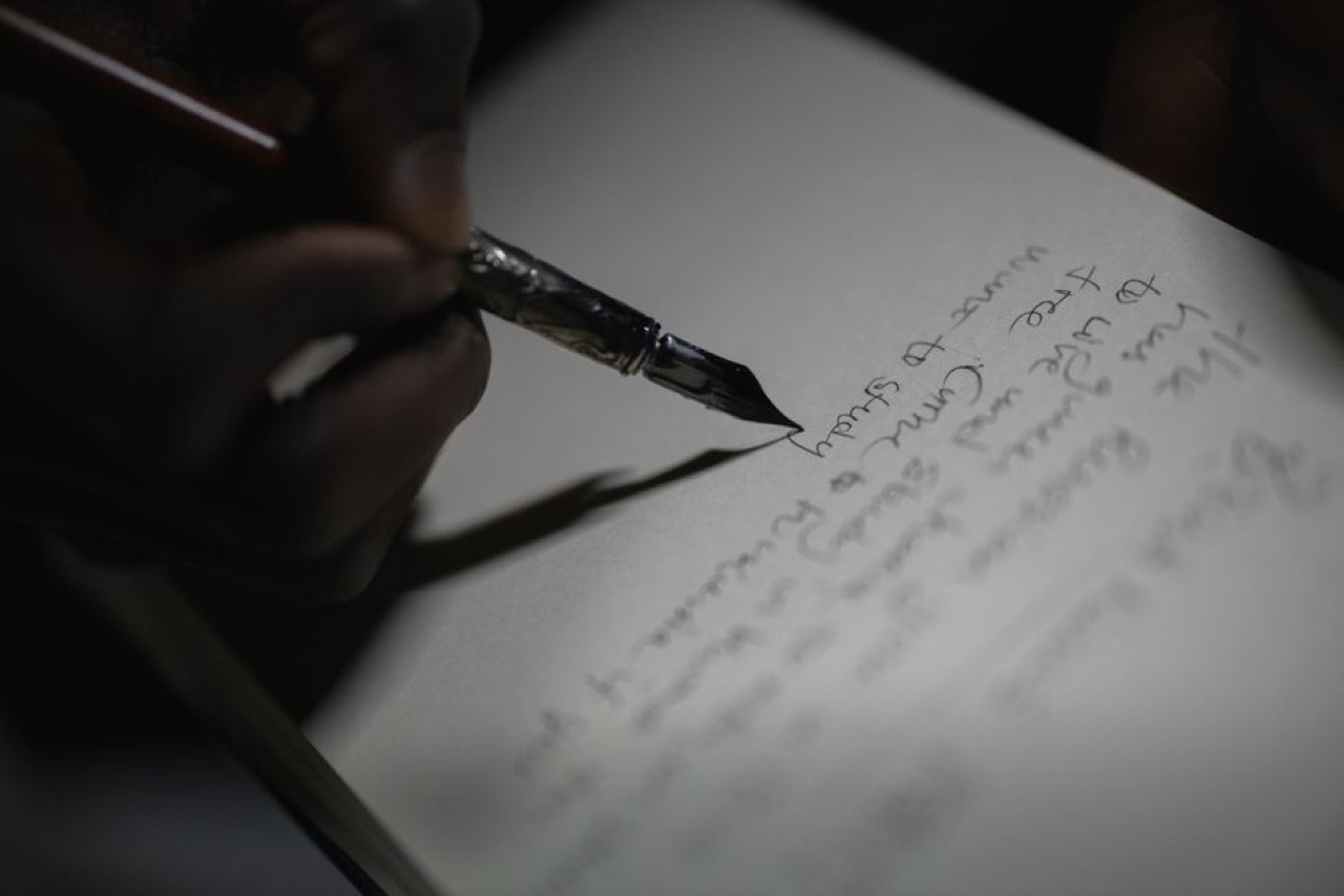 Funeral program in isiXhosa and Sesotho Fountain pen writing note