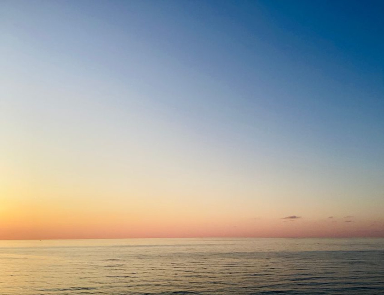 Funeral tombstones and unveilings in South Africa Calm sunset ocean