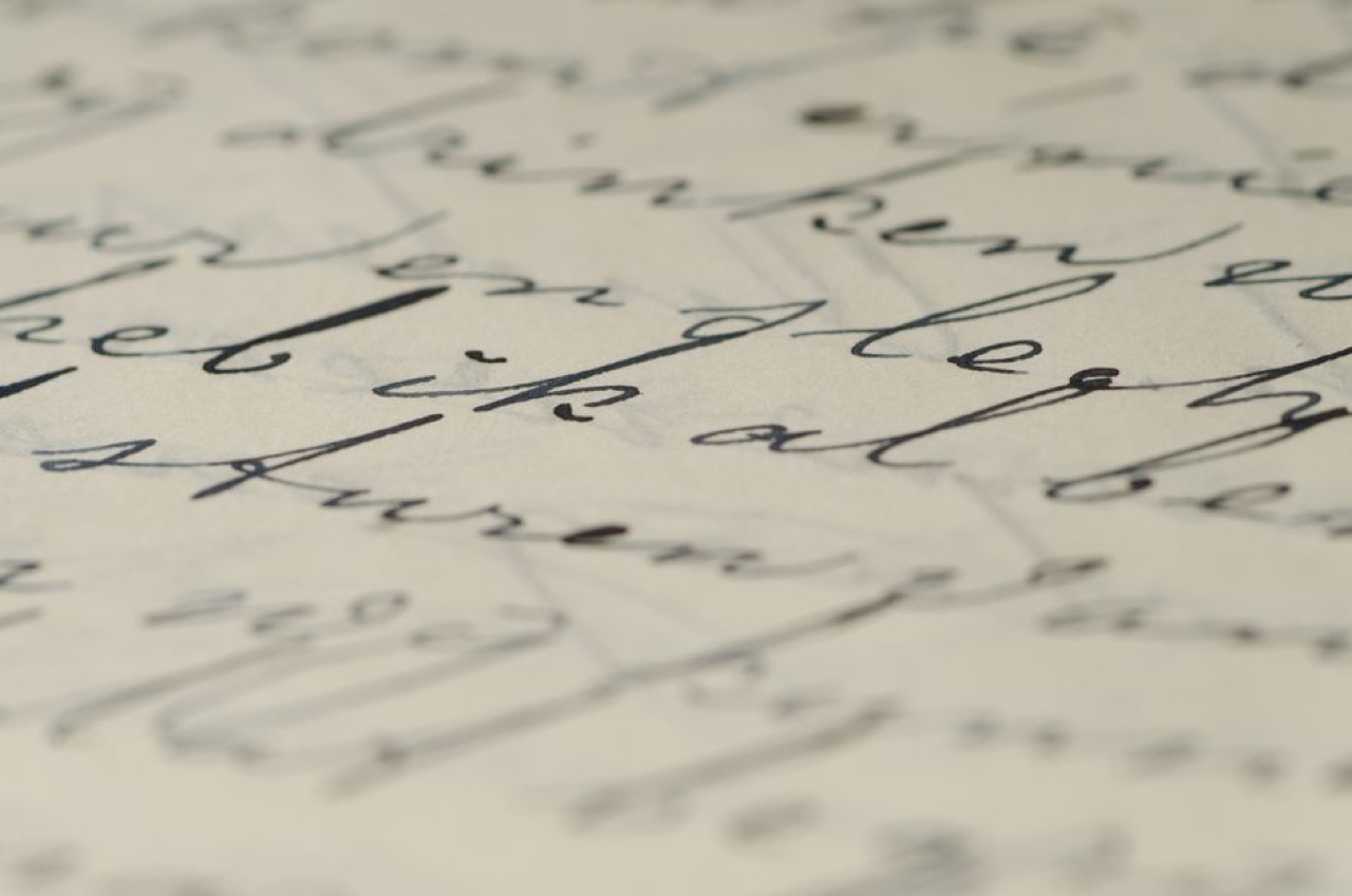 Order of service for a funeral Handwriting letter close up